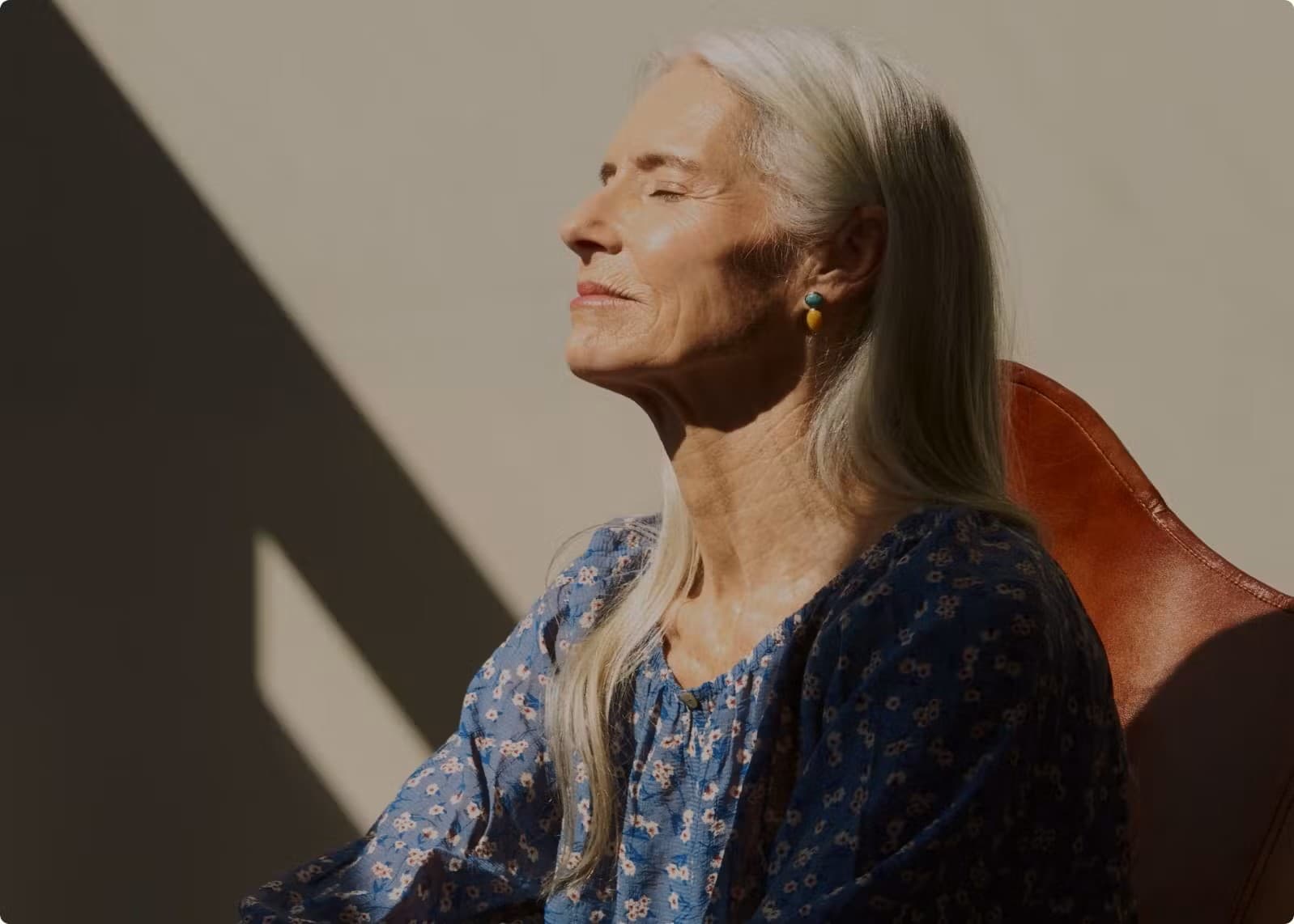 A woman in relaxed and content state